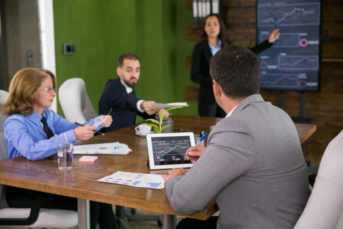 Business owner reviewing financial documents and planning strategies